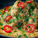 Close up Indian influenced lamb pasanda curry.