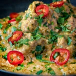 Close up Indian influenced lamb pasanda curry.
