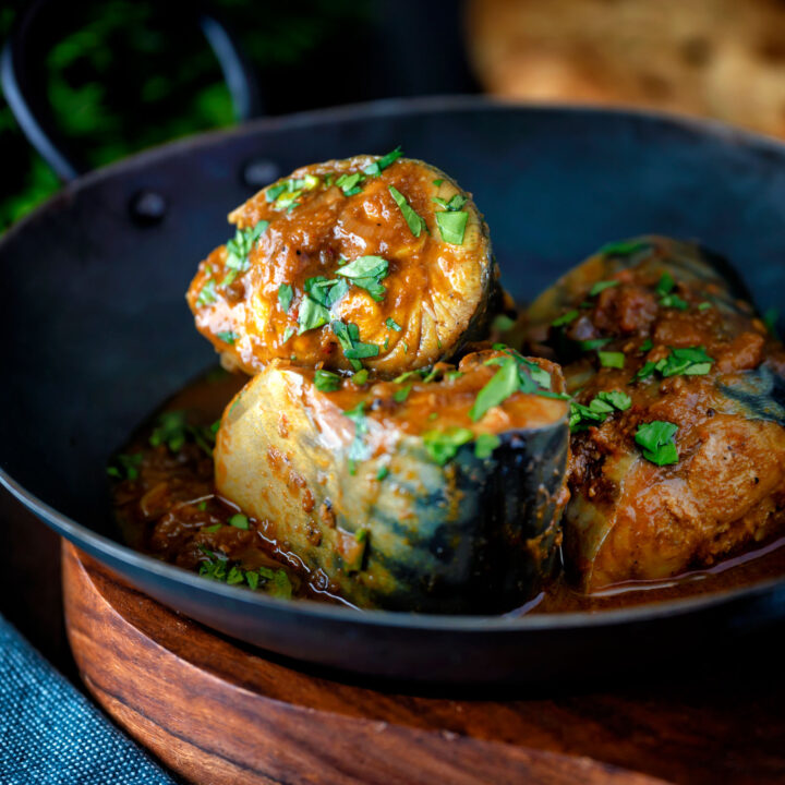 Spicy Goan influenced mackerel curry served in a karai.