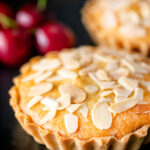 Mini Bakewell tarts with a frangipane filling and almond topping.