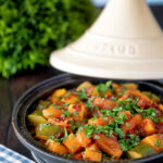 Moroccan influenced vegan vegetable tagine with squash and courgette.