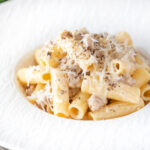 Pasta alla norcina with black pepper and fresh parmesan cheese.