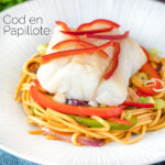 Cod loin cooked en papillote served with sweet chilli noodles featuring a title overlay.