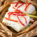 Cod loin cooked en papillote with Asian flavours.