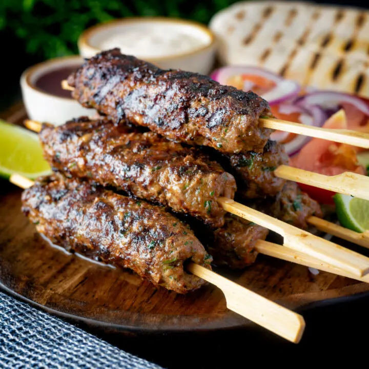 Lebanese influenced minced beef kofta kebabs served with salad, pita bread and sauces.