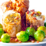 Sage and onion stuffed chicken ballotine served with gravy, sprouts and Yorkshire pudding.