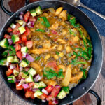 Ovehead chicken dhansak lentil curry with kachumber salad.