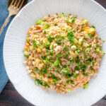 Overhead Chinese takeaway style egg fried rice.