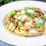 Cod pasta with pesto, peas and bacon.