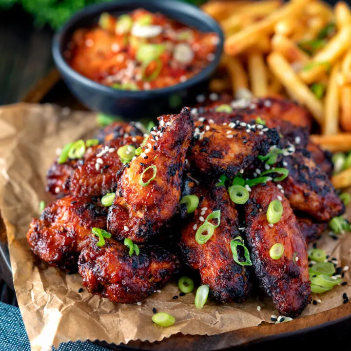 Korean influenced chicken wings served with French fries, kimchi and spring onions.