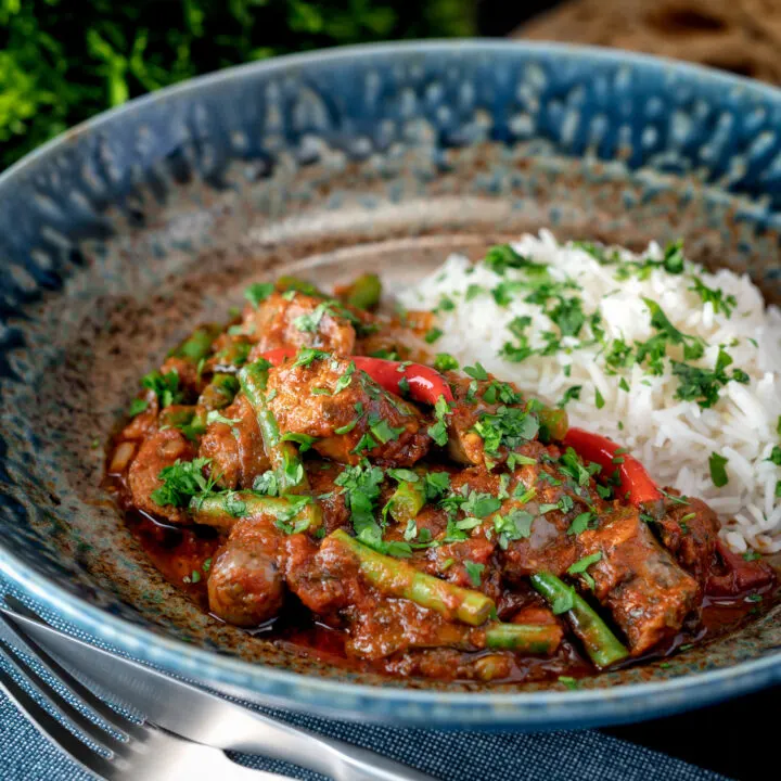 Anglo Indian spicy beef sausage curry served with rice.