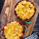 Two individual sausage and mash pies.