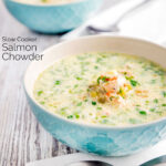 Slow cooker salmon chowder served in blue bowls featuring a title overlay.