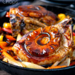 Sweet and sour pork chops with pineapple rings and peppers featuring a title overlay.