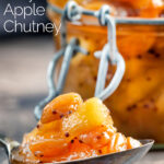 Close up apple chutney with golden raisins featuring a title overlay.