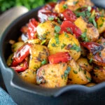 Batata harra Lebanese or Syrian spicy potatoes with red peppers.