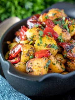 Batata harra Lebanese or Syrian spicy potatoes with red peppers.