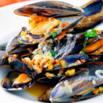 Beer steamed mussels with shallot, chilli and garlic.