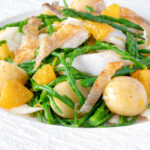 Cod fish salad with asparagus, samphire, new potatoes and orange.