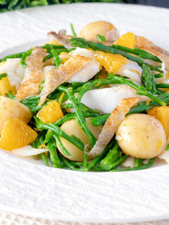 Cod fish salad with asparagus, samphire, new potatoes and orange.