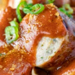 Close up homemade German currywurst with curry ketchup.