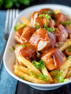 Homemade German currywurst with French fries.
