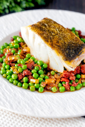 Pan fried cod loin with chorizo sausage, peas and leeks.