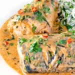 Close up Thai mackerel choo chee curry served with coriander rice.