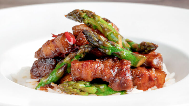 Twice cooked Korean pork belly with a gochujang glaze and asparagus.