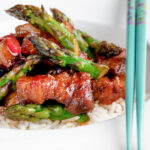 Korean pork belly with a gochujang glaze and asparagus.