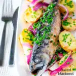 Baked whole mackerel with salad potatoes, red onions and chives featuring a title overlay.