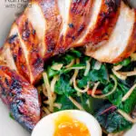 Close up overhead hoisin chicken breast ramen with Swiss chard and a soft boiled egg featuring a title overlay.