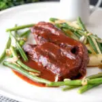 Lamb shoulder chops, red wine and tomato sauce with mash and green beans.
