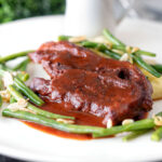 Lamb shoulder chops, red wine and tomato sauce with mash and green beans.