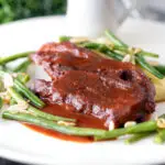 Lamb shoulder chops, red wine and tomato sauce with mash and green beans.