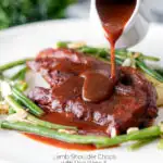 Tomato and red wine sauce poured over lamb shoulder chops featuring a title overlay.