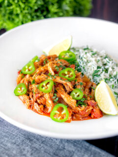 Mexican shredded chicken stew served with coriander rice and jalapenos.