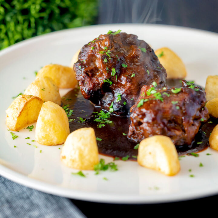 Rabo de toro or Spanish stewed oxtail served with Parmentier potatoes.