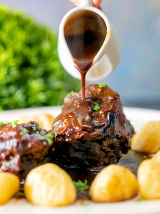 Rich gravy poured over rabo de toro or Spanish oxtail served with Parmentier potatoes.