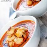 Roasted tomato soup with garlic croutons and balsamic reduction featuring a title overlay.
