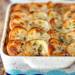 Crispy scalloped potato topped sausage hotpot with cider onion gravy.