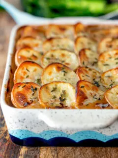 Crispy scalloped potato topped sausage hotpot with cider onion gravy.