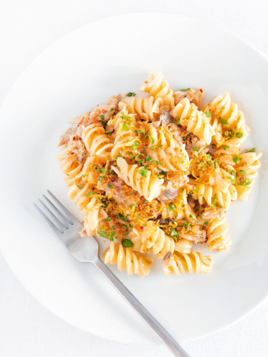 Overhead smoked mackerel pasta with fusilli, chilli, lemon and golden breadcrumbs.