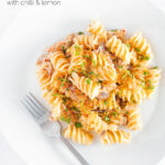 Overhead smoked mackerel pasta with fusilli, chilli, lemon and golden breadcrumbs featuring a title overlay.