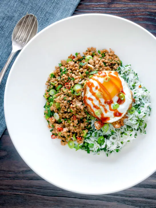 Overhead Thai minced pork with coriander rice and a fried egg.