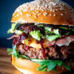 Veal burger with port onions, gouda cheese and crispy parma ham.