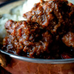 Close-up Indian-inspired beef vindaloo curry.