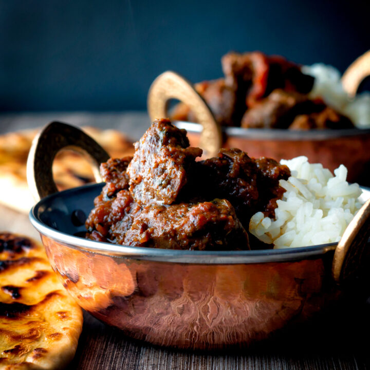 Indian-inspired beef vindaloo curry with naan bread.