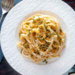 Overhead blue cheese pasta with fettuccini and a crispy golden sage crumb.
