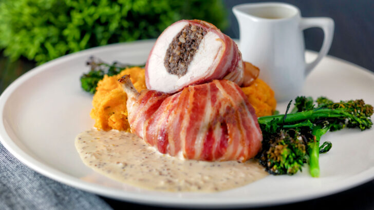 Scottish chicken Balmoral with whisky cream sauce, carrot & swede mash and broccoli.